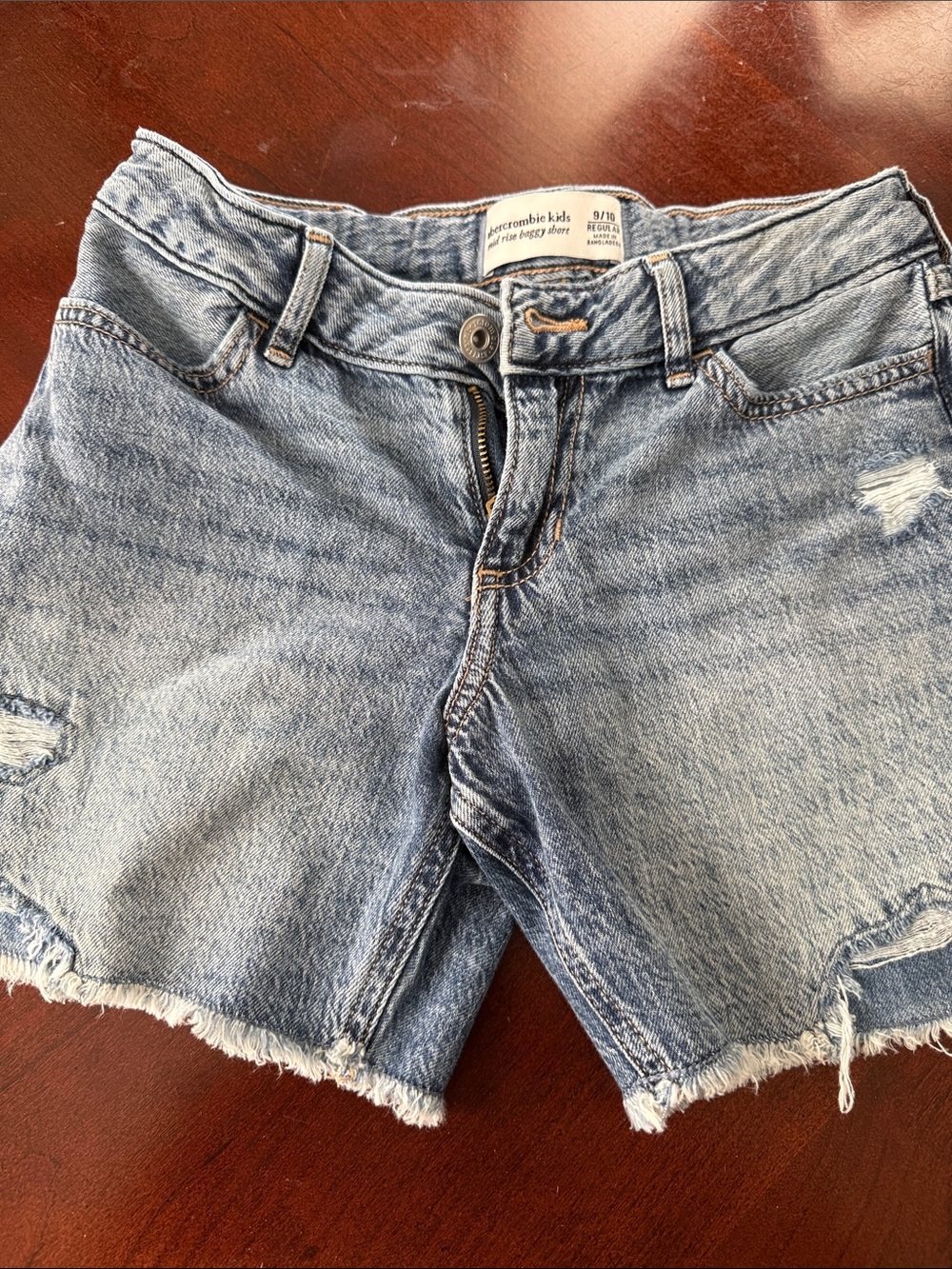 abercrombie kids faded blue distressed denim cutoff shorts